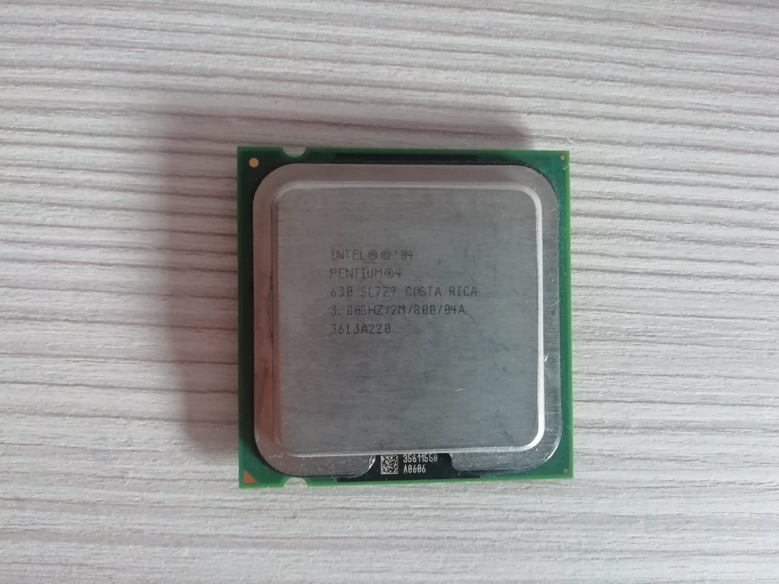 The first Intel CPU to support hyper threading was the Pentium 4 HT (where HT stands exactly for Hyper Threading). The complete datasheet for the Pentium 4 HT can be found here. For more information on the HT technology, please refer to the same handy manual as before. Photo from author.